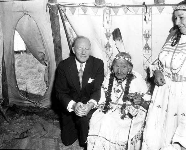 Original title:  The investiture of James Muir, President of the Royal Bank of Canada, as Hon. Chief Eagle Ribs in the Blood Indian Tribe, Blackfoot Confederacy. 1954