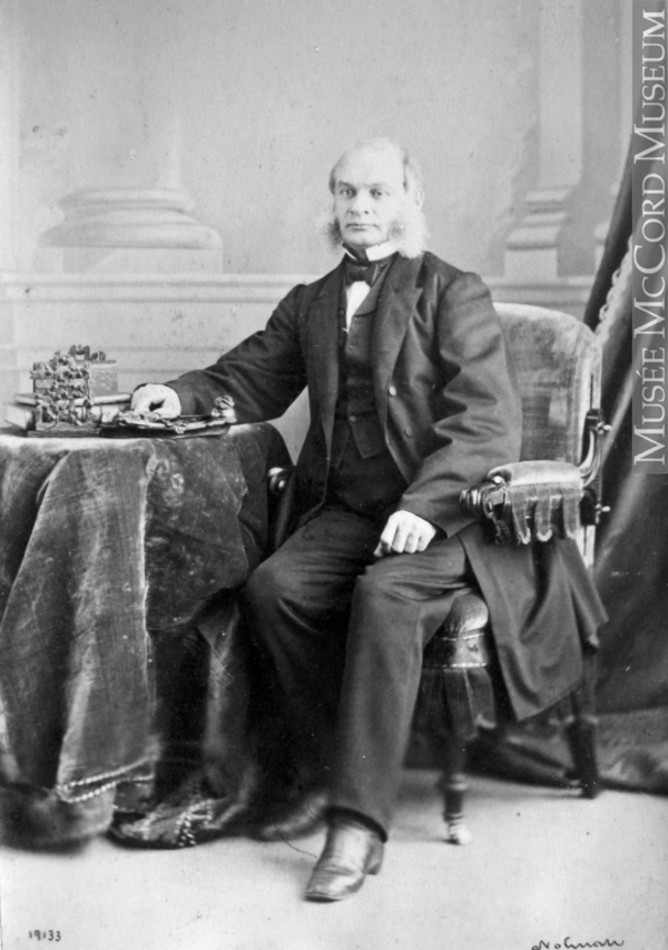 Titre original&nbsp;:  Photograph John Lovell, Montreal, QC, 1865 William Notman (1826-1891) 1865, 19th century Silver salts on paper mounted on paper - Albumen process 8 x 5 cm Purchase from Associated Screen News Ltd. I-19133.1 © McCord Museum Keywords:  male (26812) , Photograph (77678) , portrait (53878)