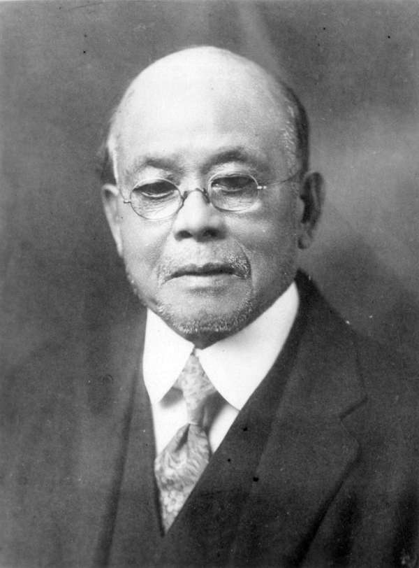 Original title:  [Head and shoulders studio portrait of Yip Sang]